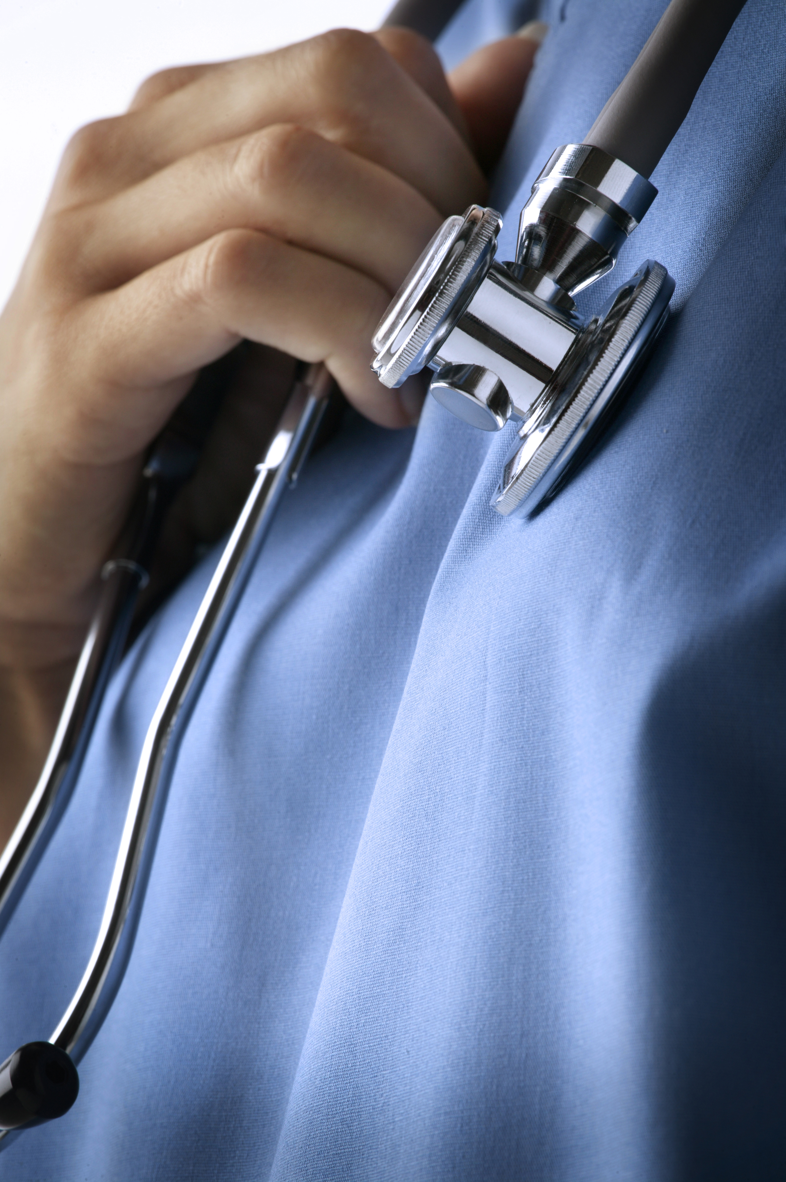 Close-up of a stethoscope around the neck of a healthcare worker